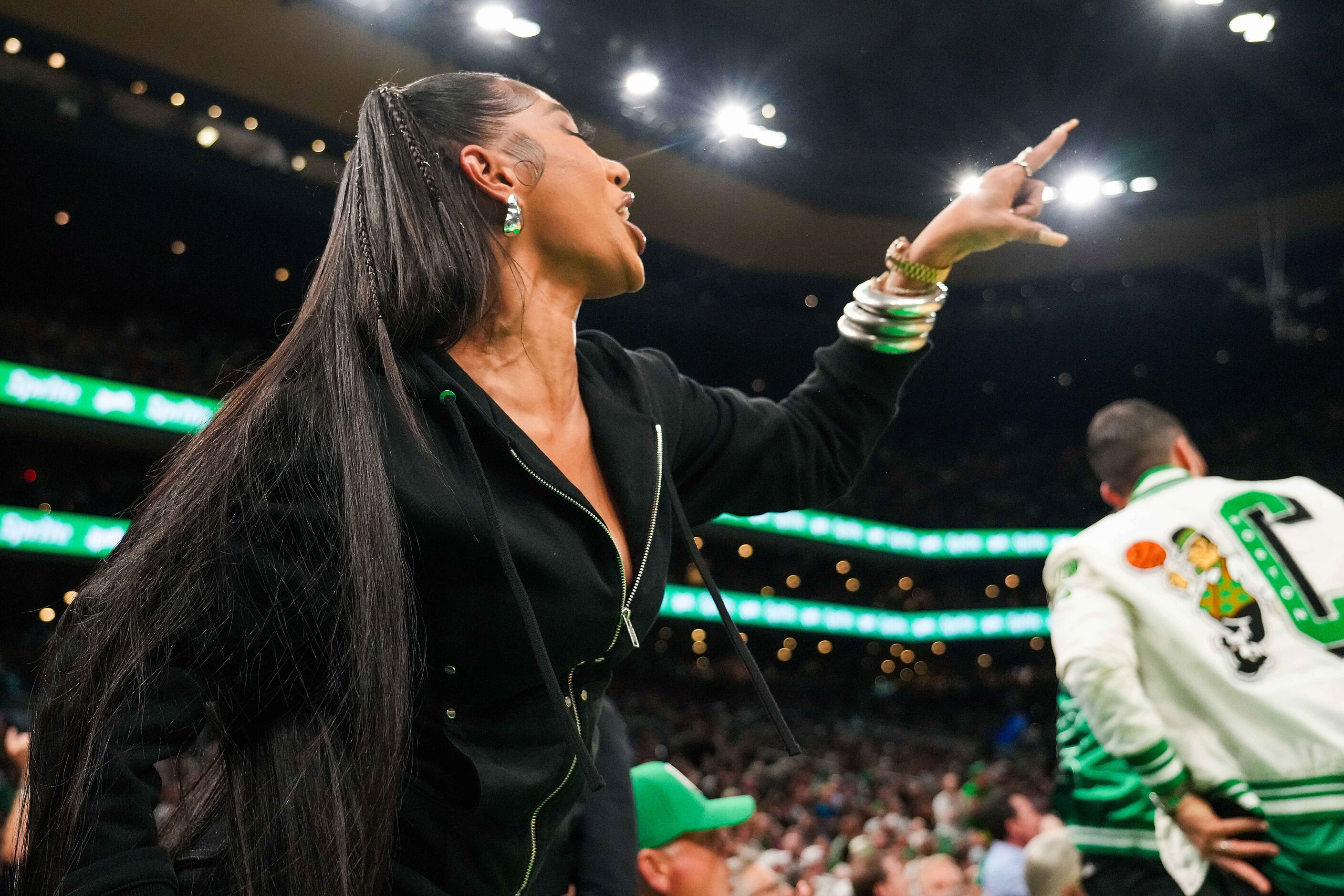 Rapper Bia reacts to a play during the first half in Game 2 of the NBA Finals between the...