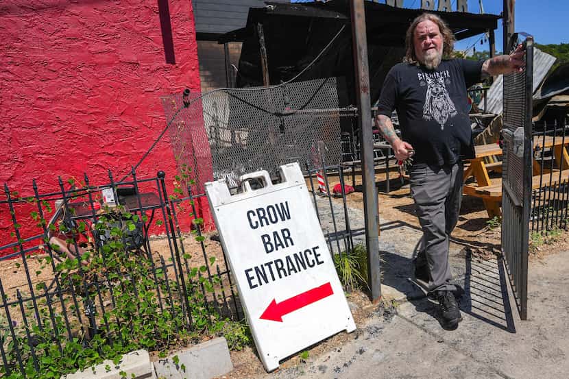 Steve Gee, owner of the Crow Bar, leaves the property through the front gate. The bar, a...