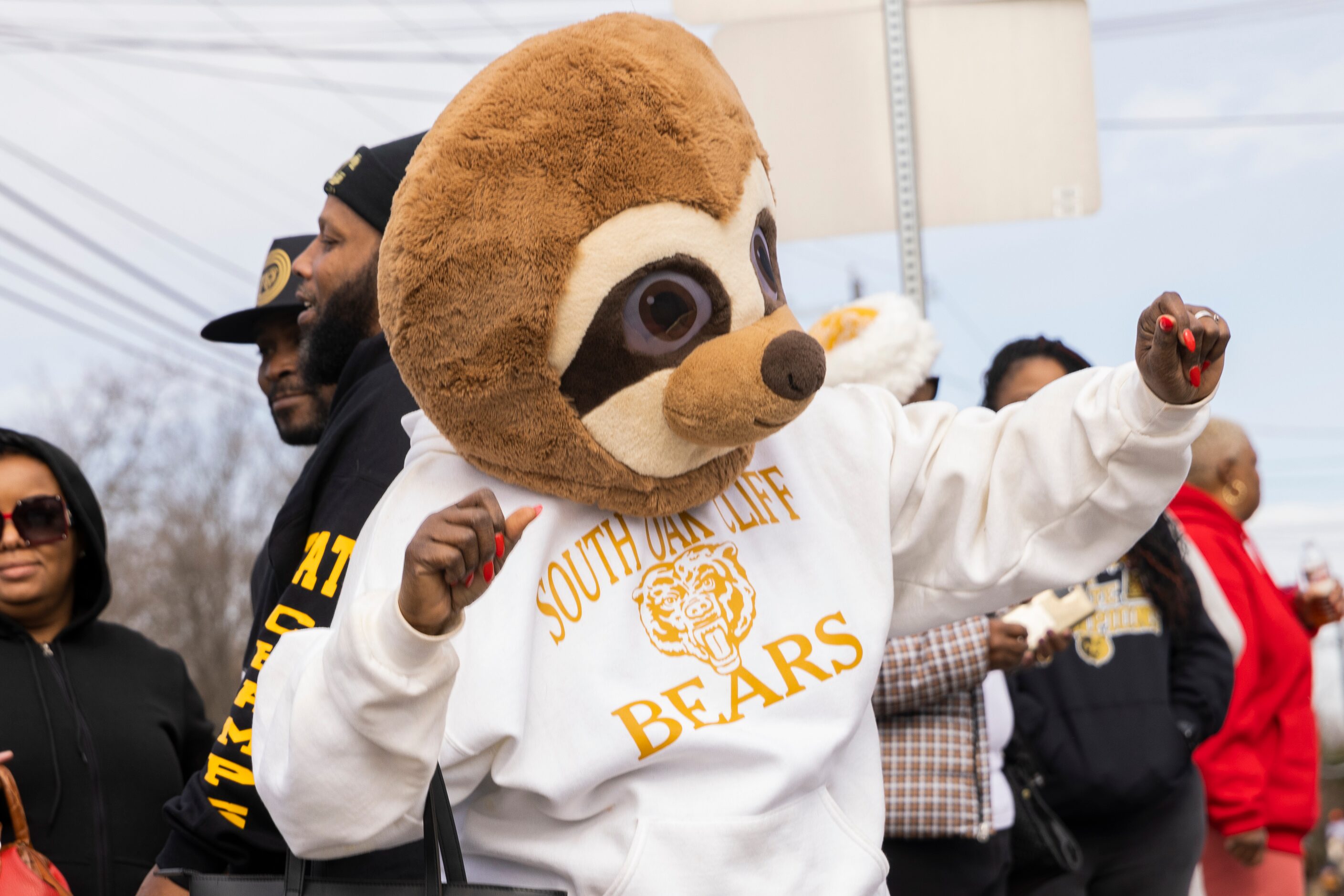 The South Oak Cliff alumna Janet Tiller dances during a parade for the school’s Class 5A...