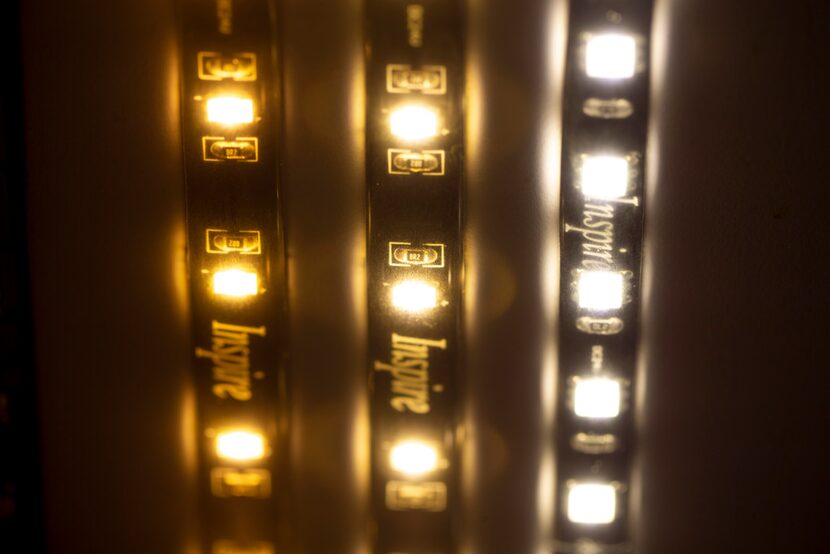 A detail of a LED lights behind some of the hidden wall designs displayed in vignettes at...