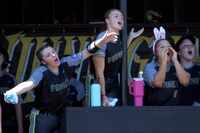 Forney players react from the dugout after the team scored a run during Game 2 of its...