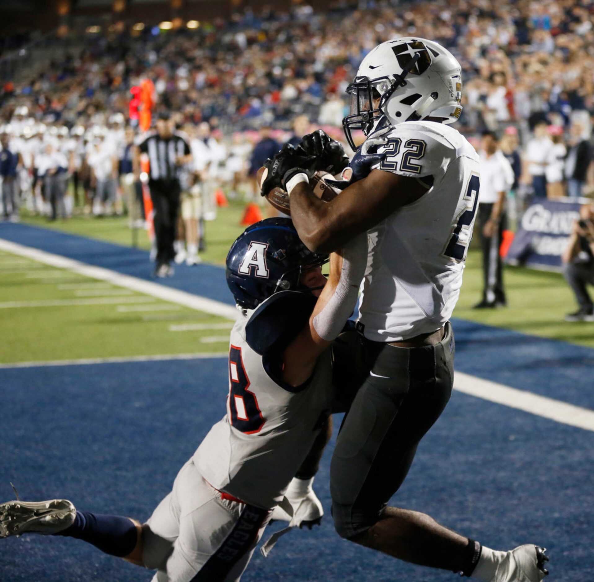 Jesuit's E.J. Smith (22) catches a pass that was ruled out of bounds in front of Will...