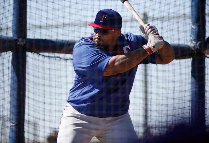 Texas Rangers first baseman Prince Fielder prepares to swing the bat in a batting practice...