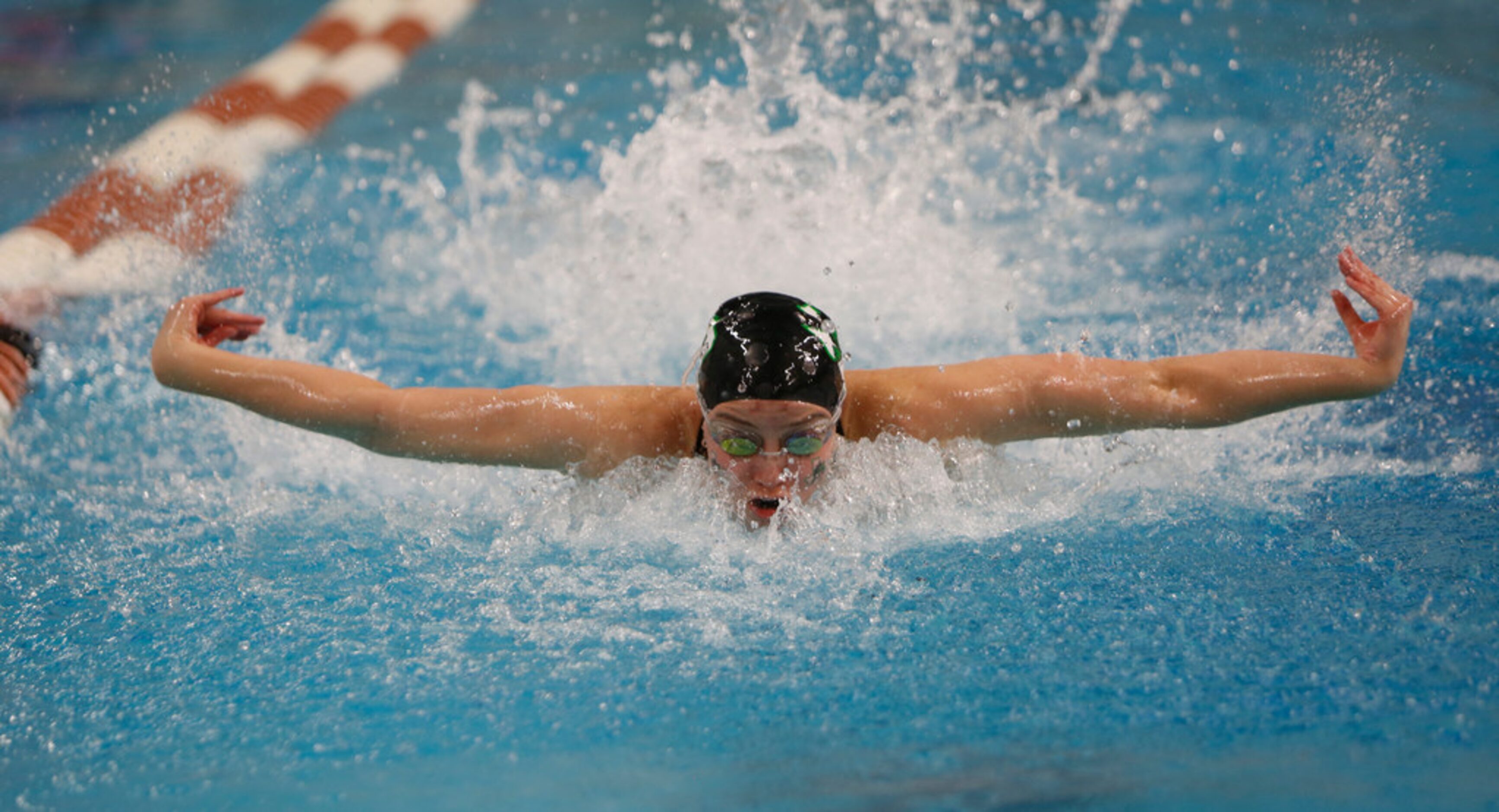 Southlake Carroll's Kit Kat Zenick powers through her leg of the Girls 200 Yard Medley...