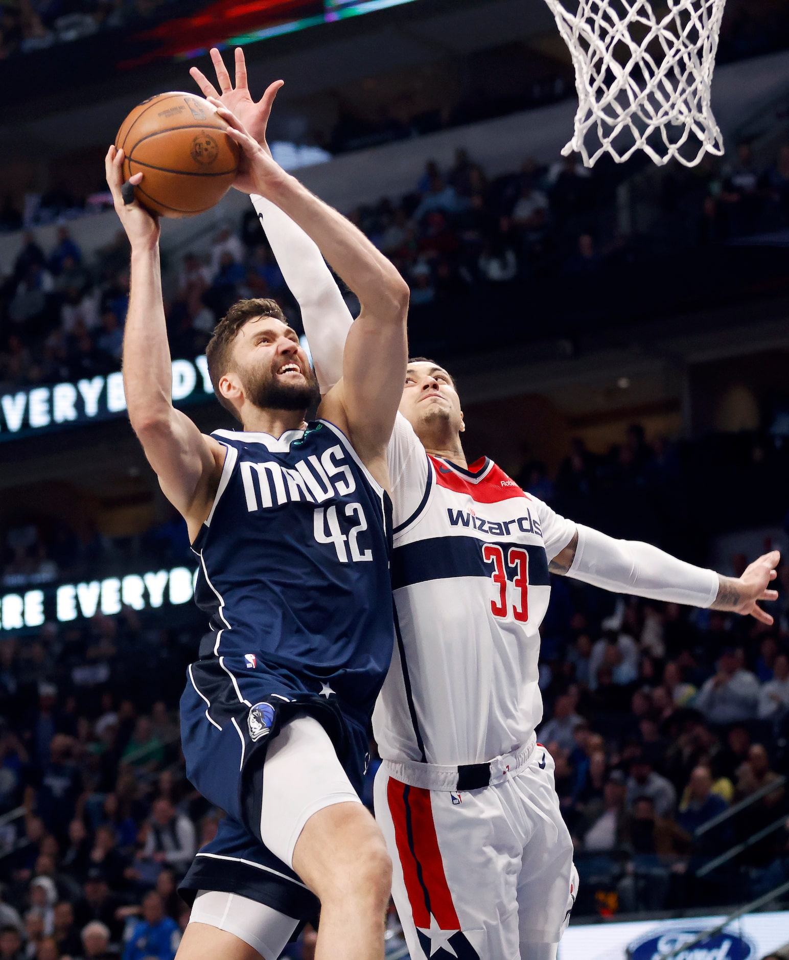 Dallas Mavericks forward Maxi Kleber (42) flies to the rim for a fourth quarter dunk against...