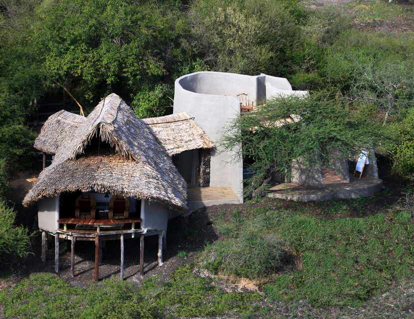 Ol Donyo Lodge offers luxury star bed accommodations in the Chyulu Hills, between two of...