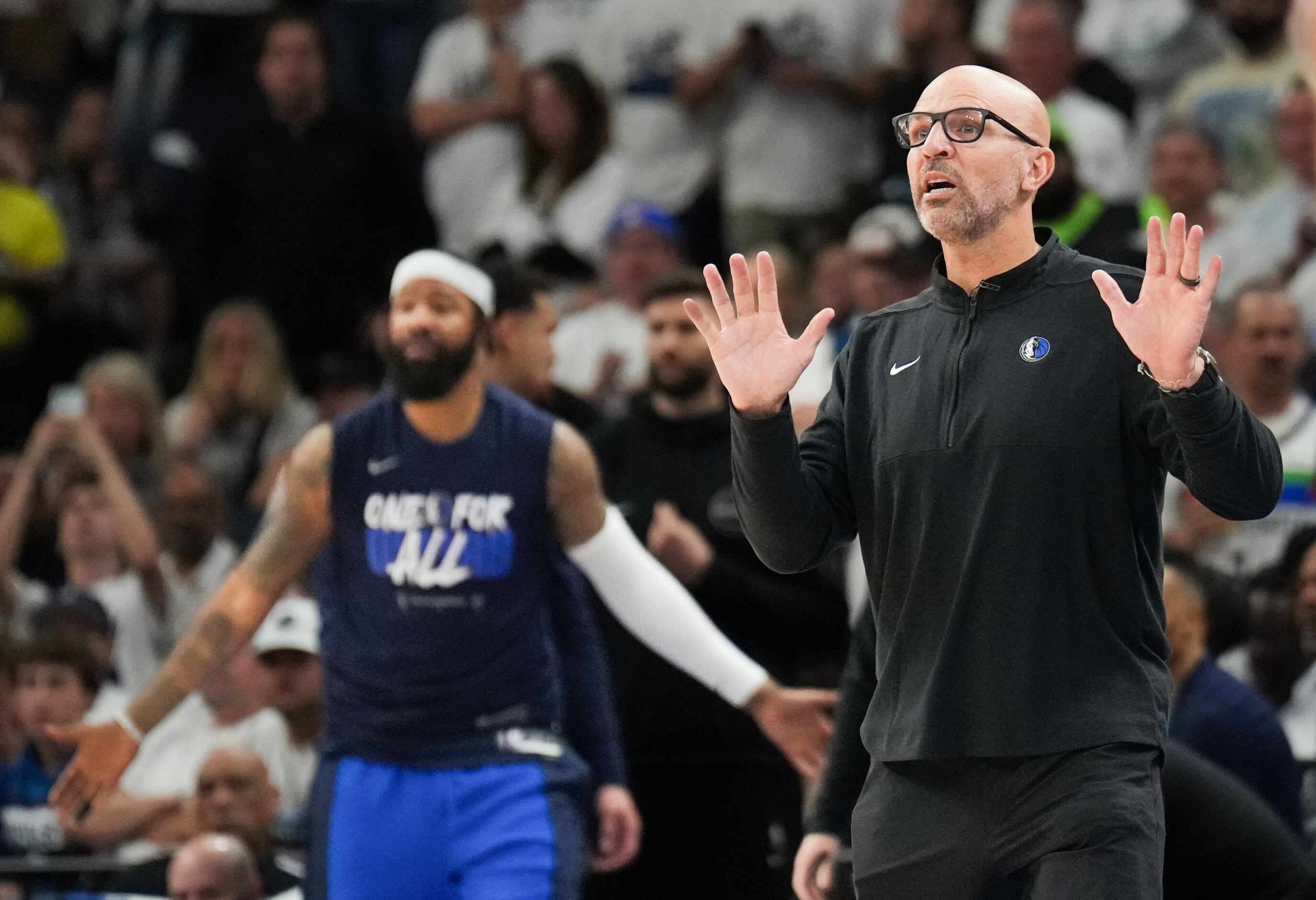 Dallas Mavericks head coach Jason Kidd calls in a play during the second half in Game 1 of...
