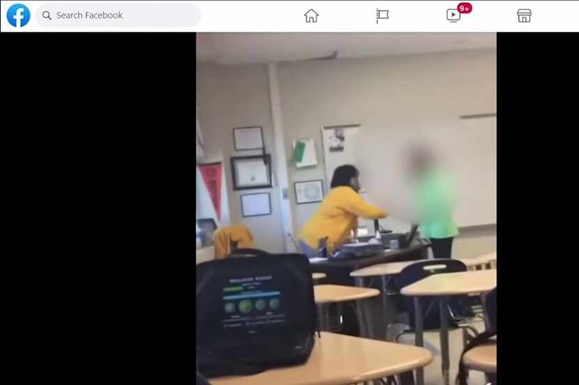 A screenshot of a viral video that showed a female student yelling at and hitting a teacher...
