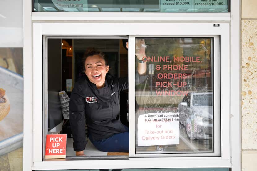 Chef Uno Immanivong of Red Stix Asian Street Food in Dallas at their take-out window