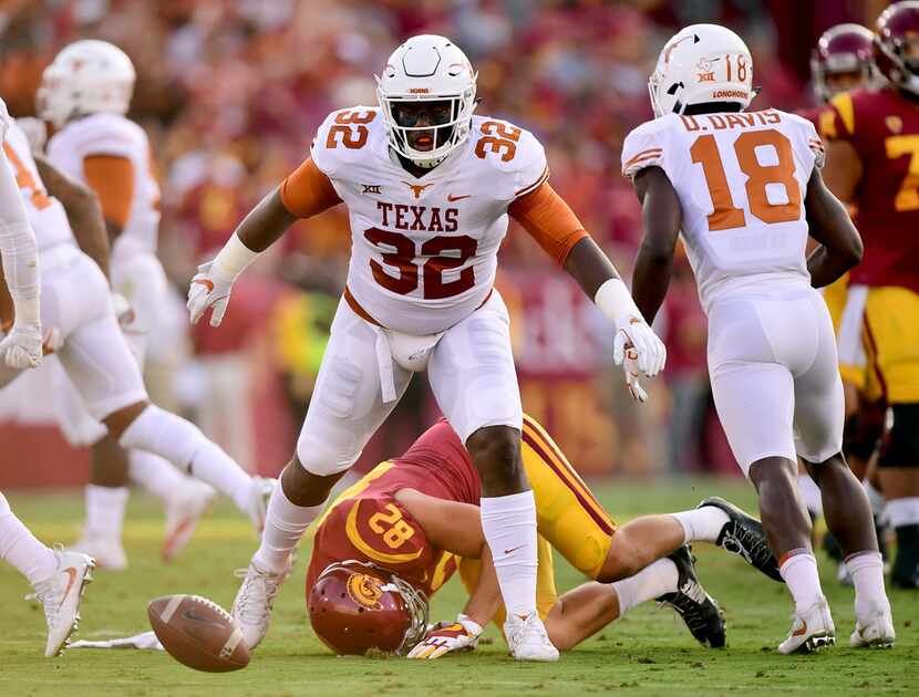 LOS ANGELES, CA - SEPTEMBER 16:  Malcolm Roach #32 of the Texas Longhorns reacts after an...