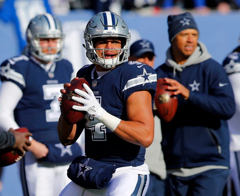 Dallas Cowboys quarterback Dak Prescott (4) looks downfield for a receiver during pregame...