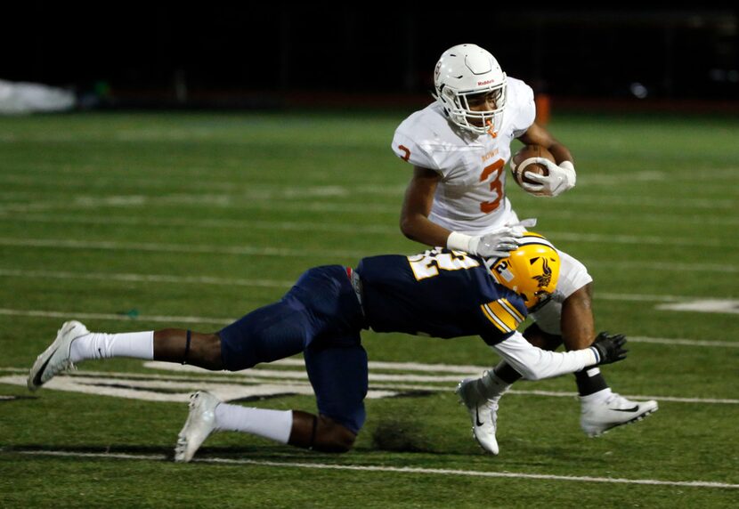 Arlington Lamar's Jordan Polk (12) tackles Arlington Bowie running back D'Aunte Prevost for...