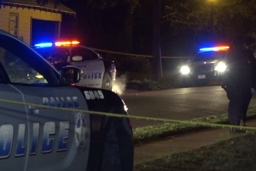 Dallas police investigate the scene of a fatal drive-by shooting Thursday night in South...