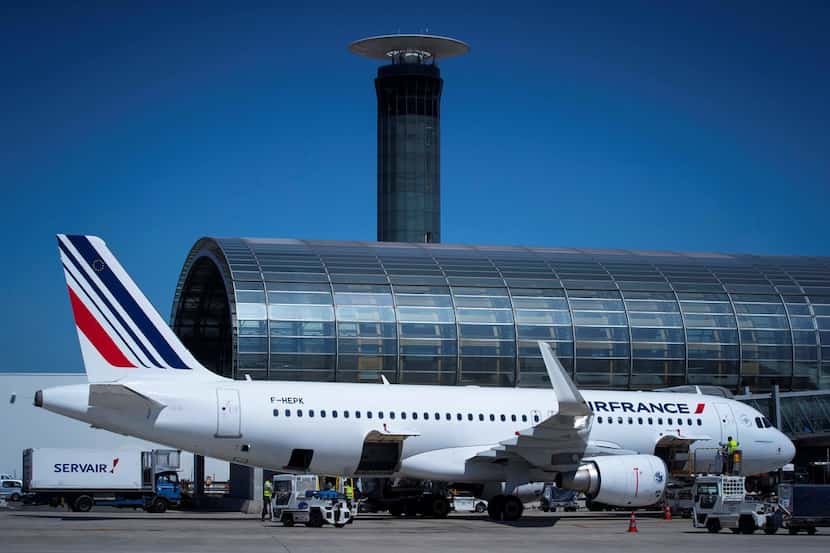 An Air France plane sits on the tarmac of Roissy-Charles de Gaulle Airport, north of Paris. 