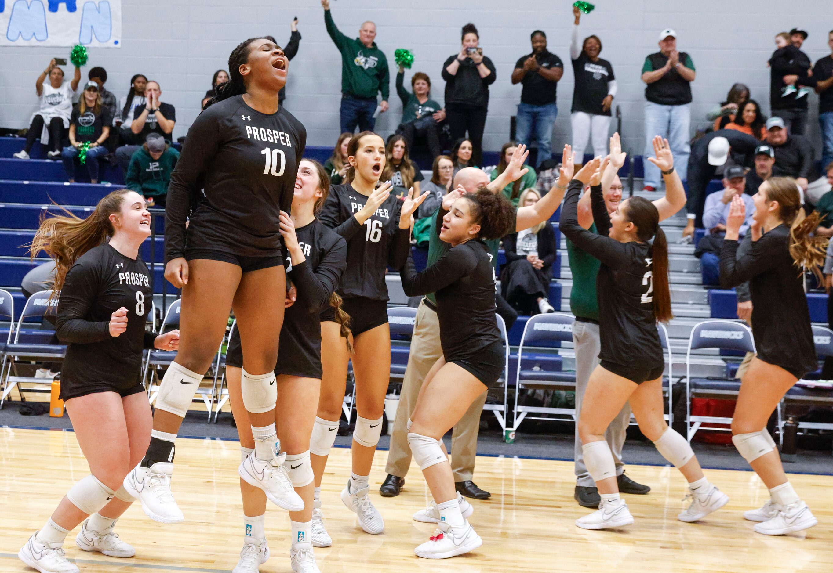 Prosper high’s players celebrate after winning against Plano West during class 6A...