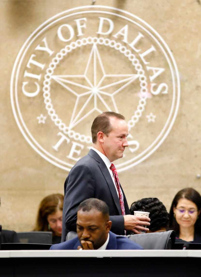 Dallas City Council member Philip Kingston heads to his seat to hear Dallas County...