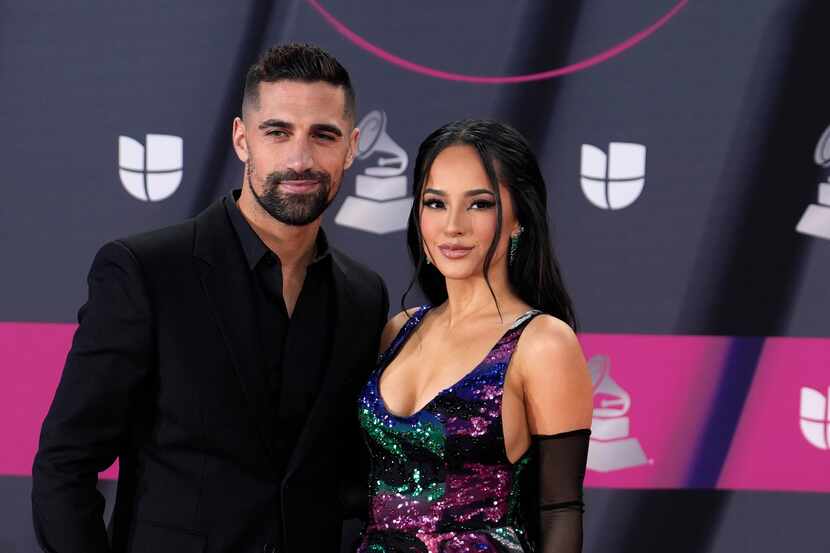 Sebastian Lletget, left, and Becky G arrive at the 23rd annual Latin Grammy Awards at the...