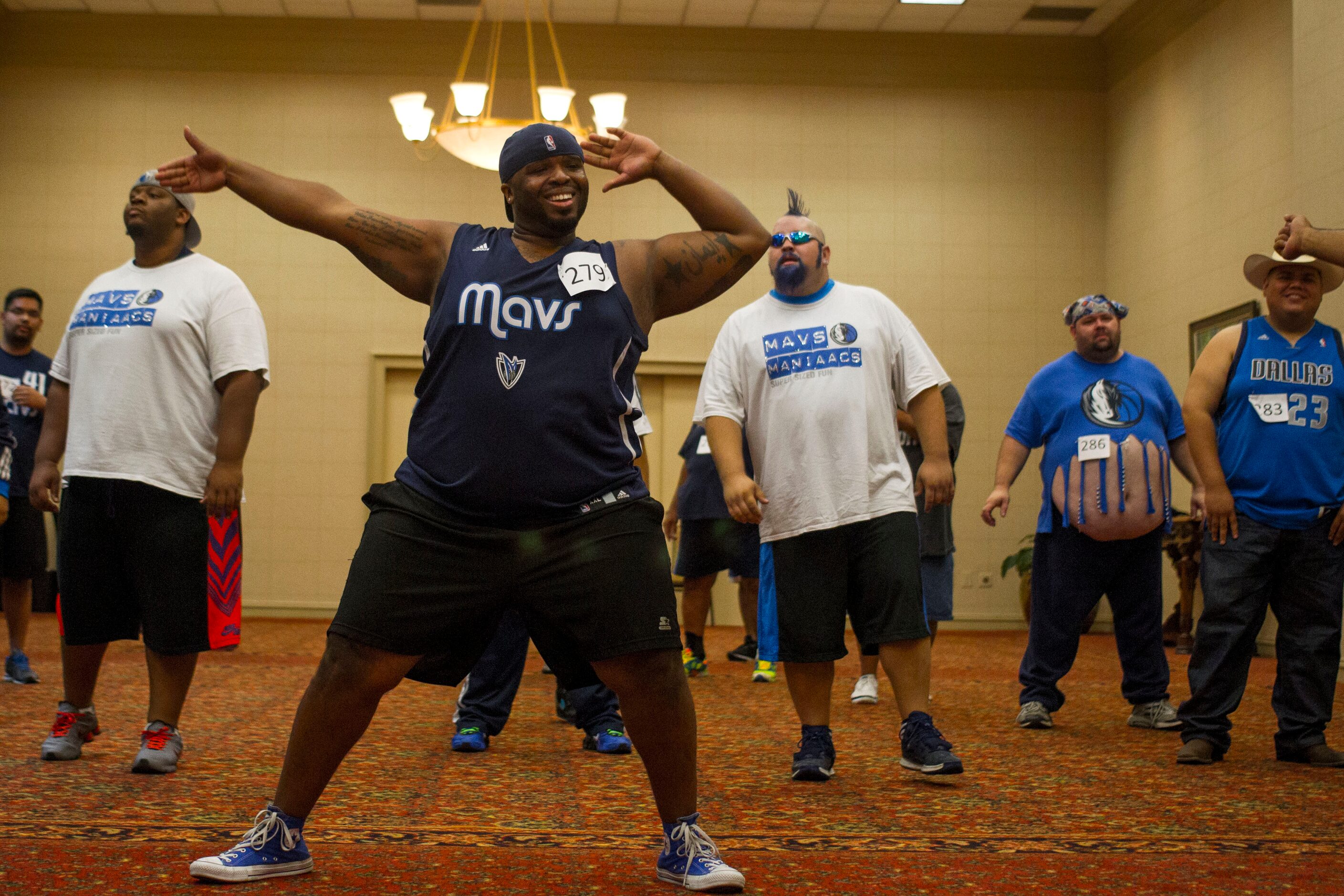 Justin O'Keith Higgs, of Dallas, performs for judges during The Mavs ManiAACs tryouts, which...