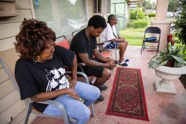 From left, Doris Wilson sits outside with grandson Edward Jackson and daughter Melanie Jones...