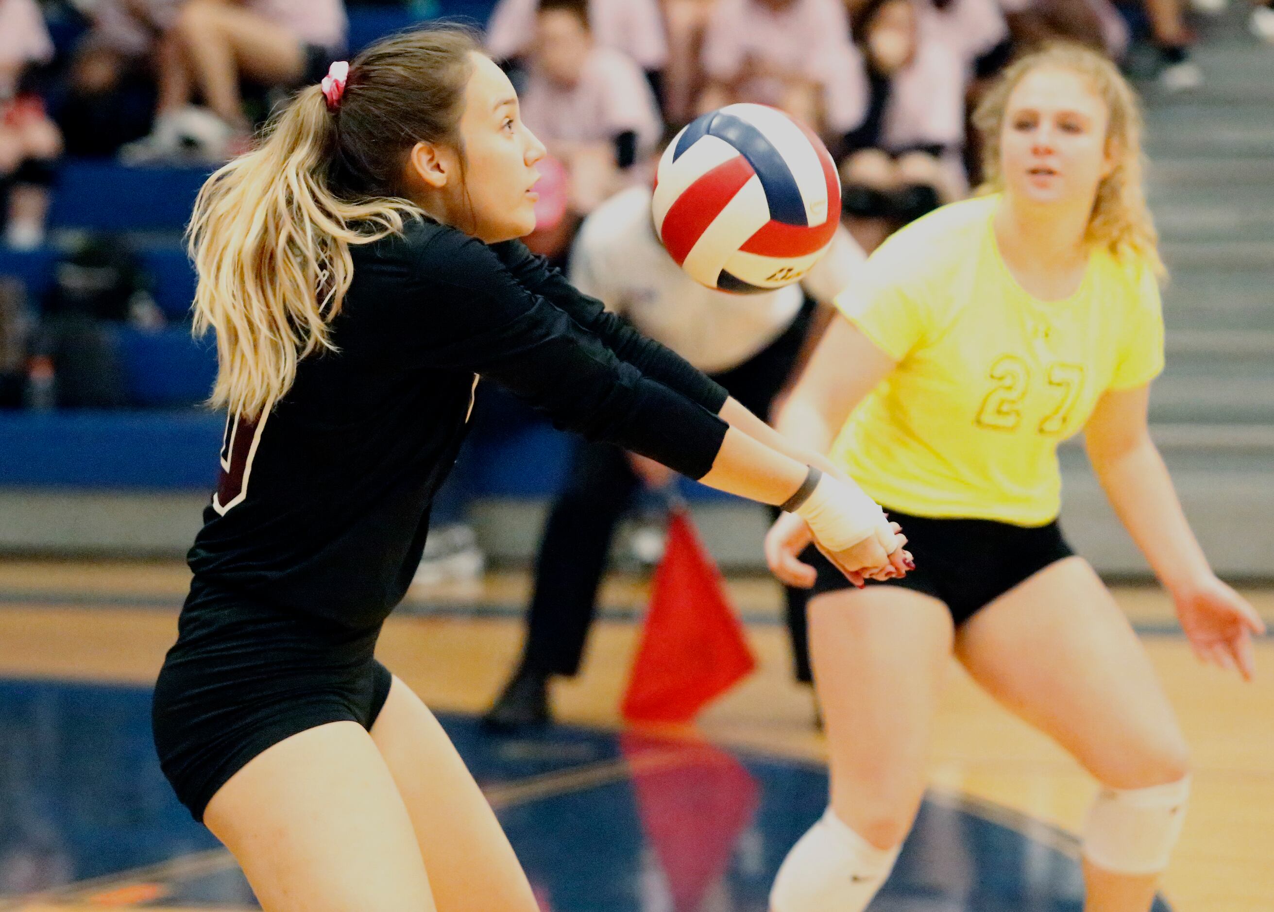 Wylie High School outside hitter Miya Cain (10) passes the volleyball during game one as...