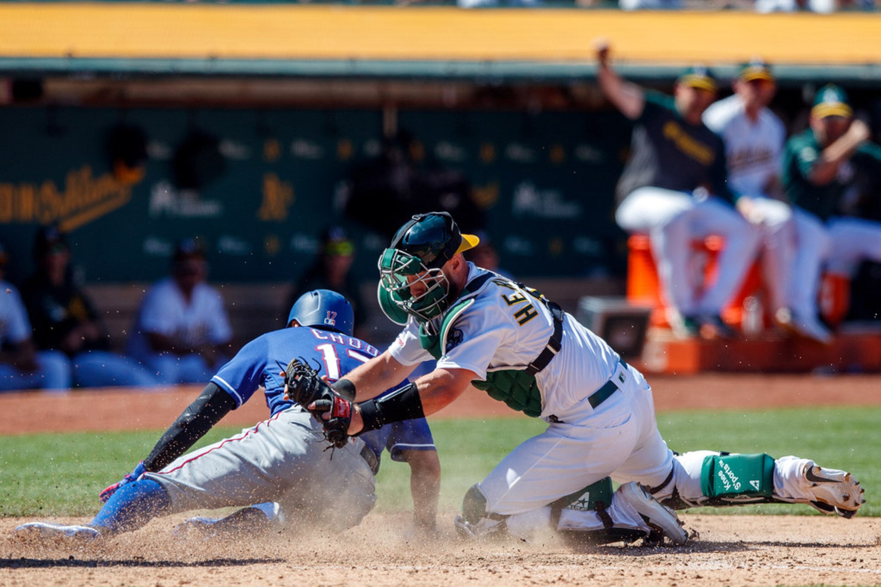 OAKLAND, CA - JULY 28:  Shin-Soo Choo #17 of the Texas Rangers is tagged out at home plate...