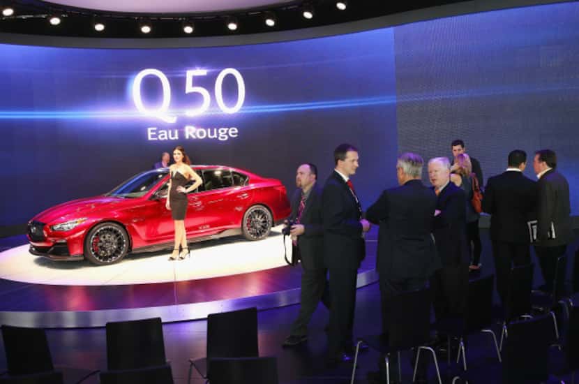 Infiniti displayed a candy-apple-red concept version of its new Q50 Eau Rouge Tuesday in...