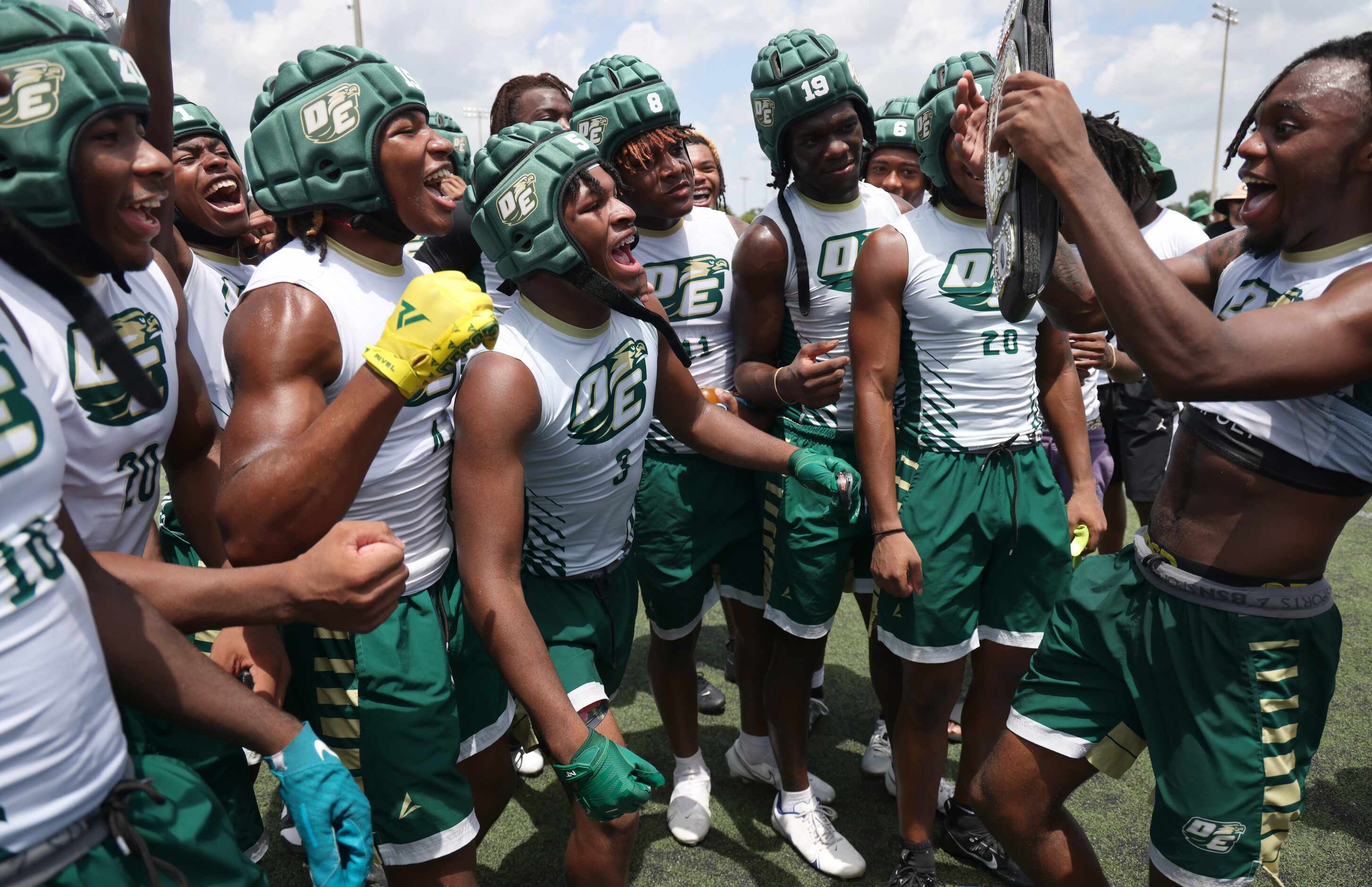 DeSoto players revel in the moment as they celebrate their 38-20 victory over Austin...