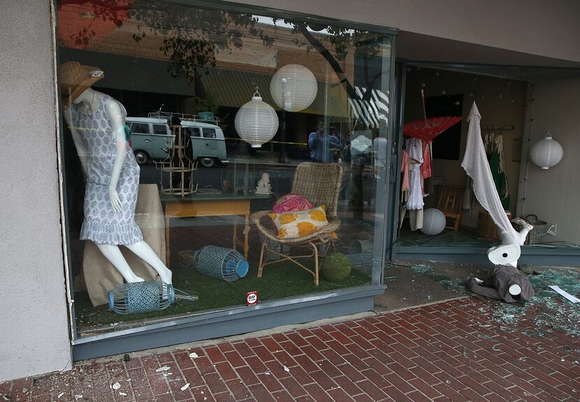 NAPA, CA - AUGUST 24:  A mannequin lays in broken glass in front of a damaged buillding...