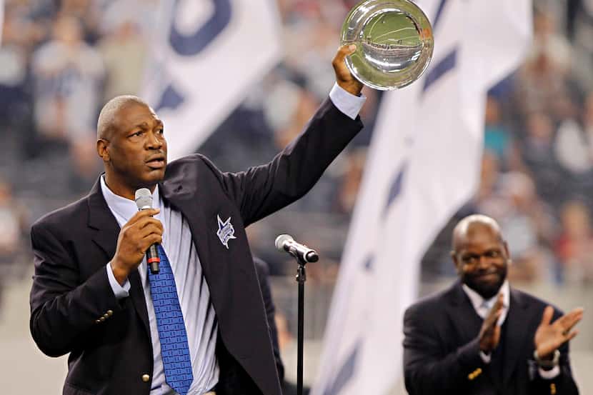 Charles Haley thanks the crowd after joining the Ring of Honor during the first half of the...