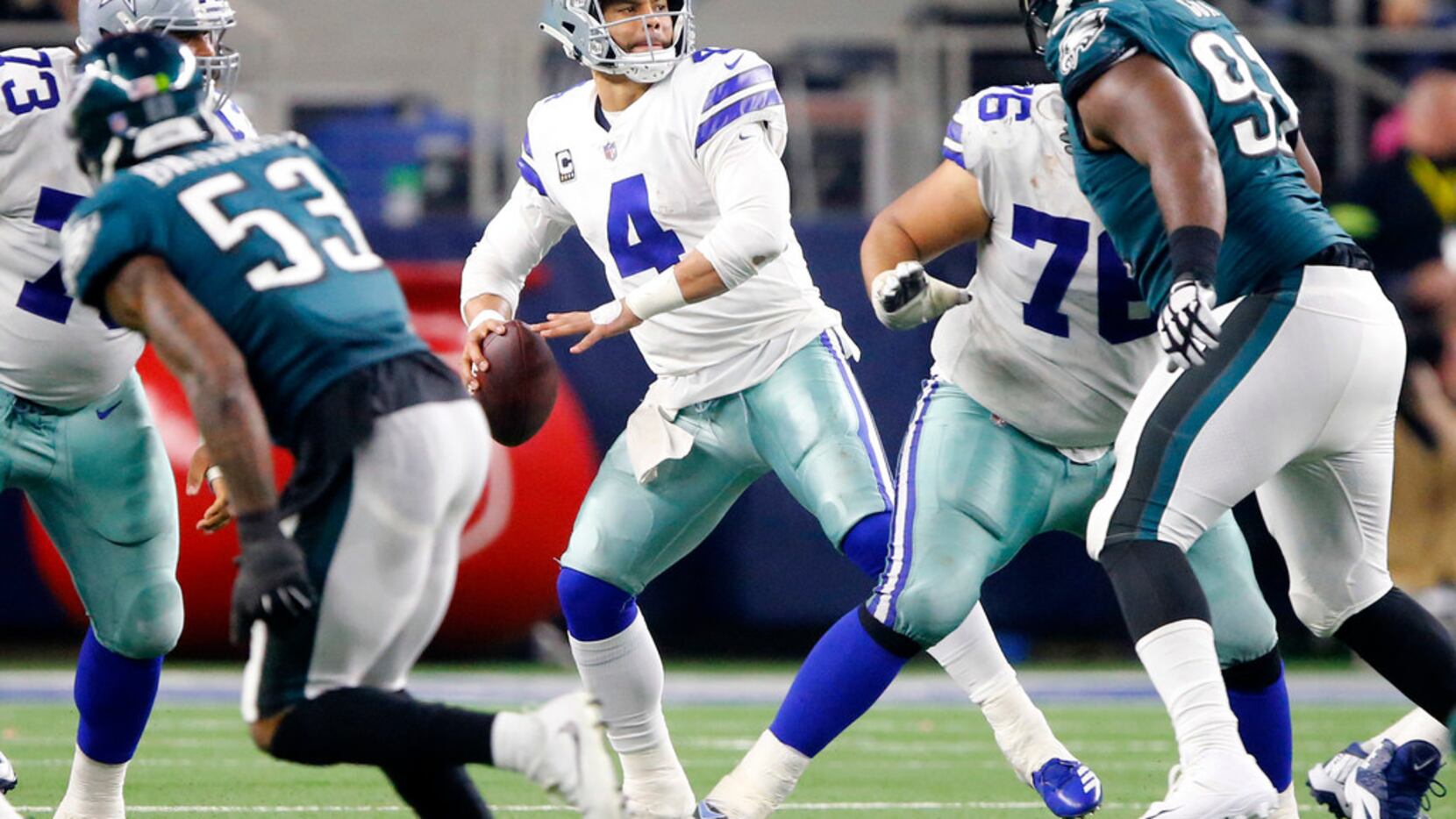 Dallas Cowboys quarterback Dak Prescott (4) looks to pass downfield against the Philadelphia...
