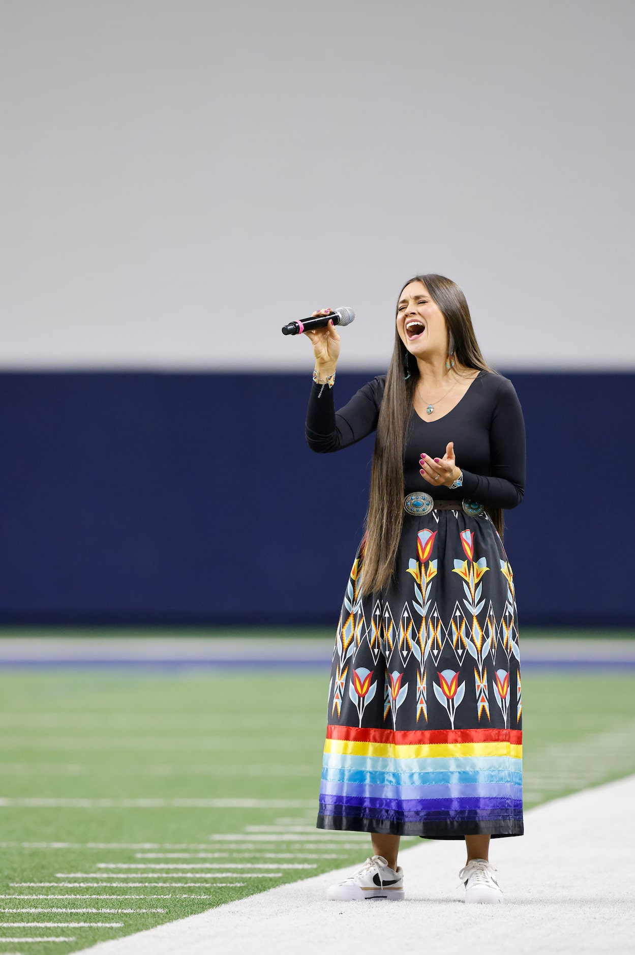 Cheyenne Gagner of Owasso, Ok sings the national anthem before the Native American All-Star...