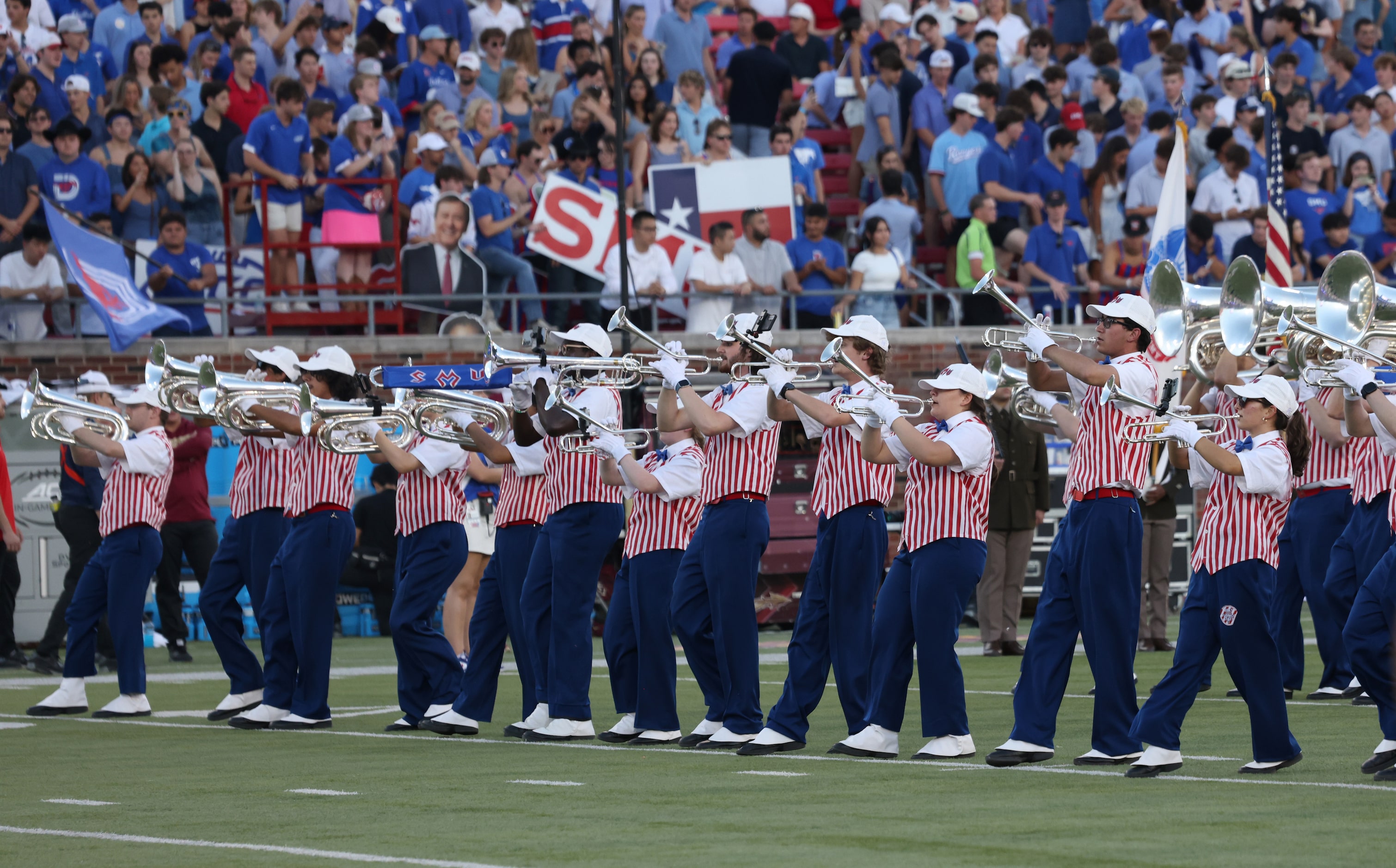 Members of the SMU Mustangs band perform on the field prior to the opening kickoff as SMU...