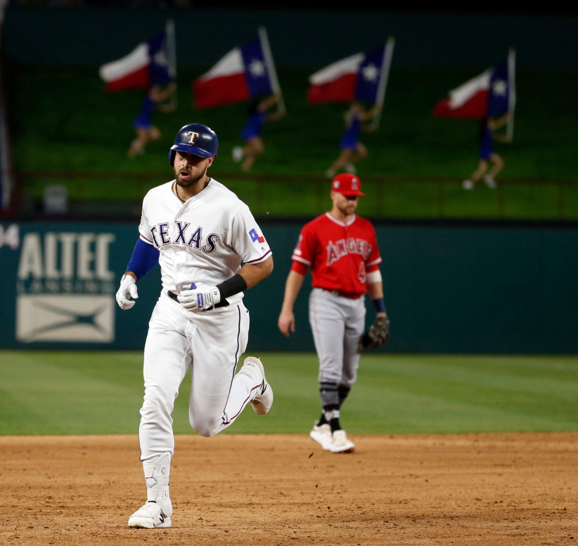 Texas Rangers' Joey Gallo runs the bases after a solo home run against the Los Angeles...