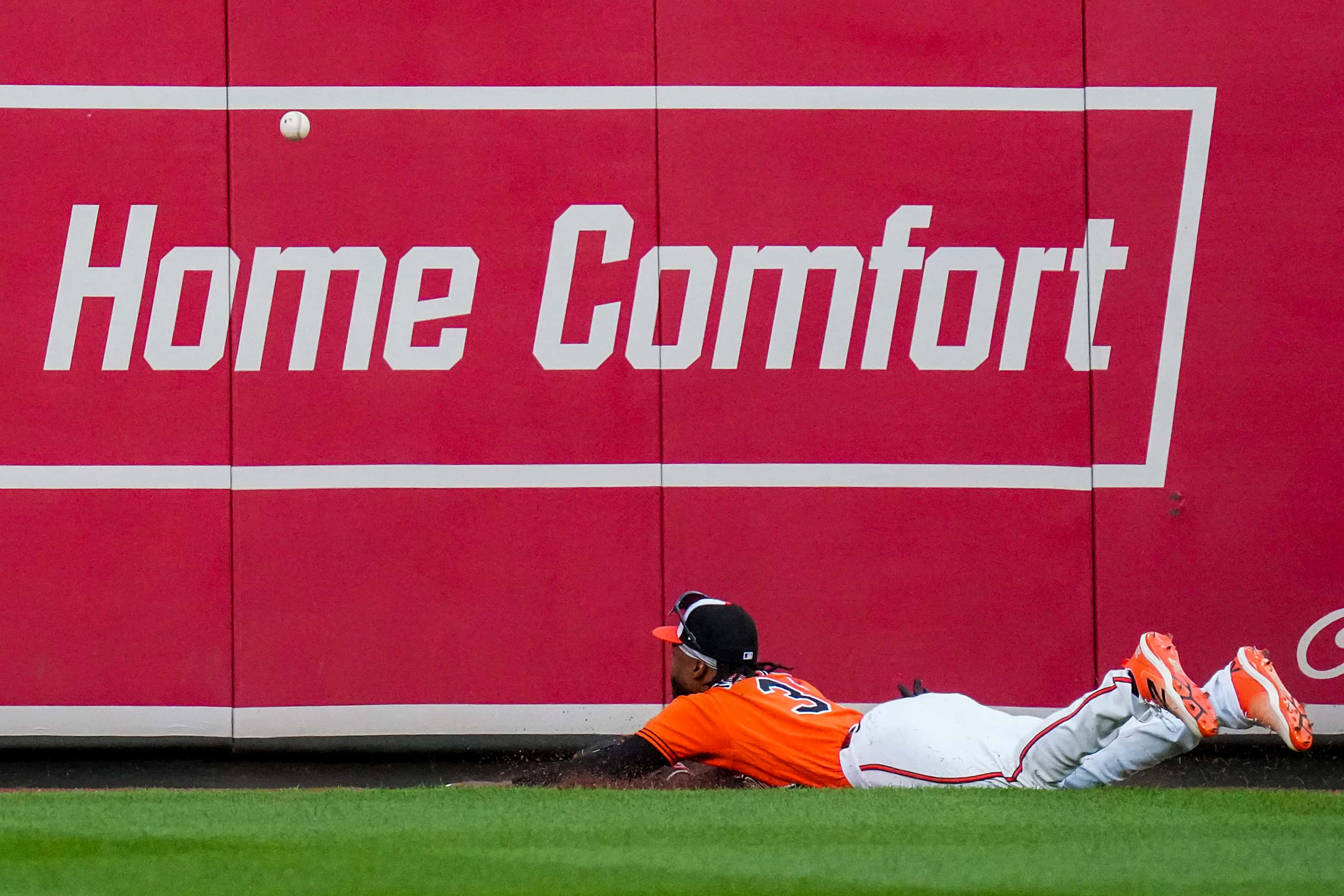 Baltimore Orioles center fielder Cedric Mullins can’t get to a 2-run double off the bat of...