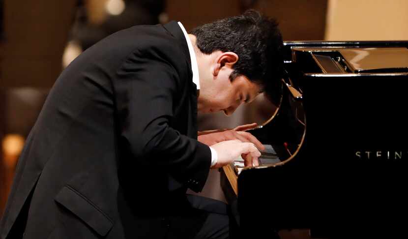 Pianist Behzod Abduraimov performs with the Dallas Symphony Orchestra and guest conductor...