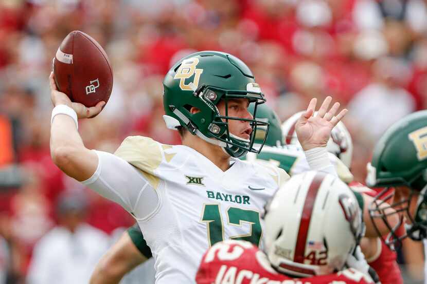 Baylor quarterback Charlie Brewer (12) passes the ball against Oklahoma in the first half of...