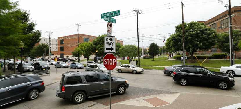 Drivers heading north on McKinney Avenue hit normal congestion around North Dallas High...