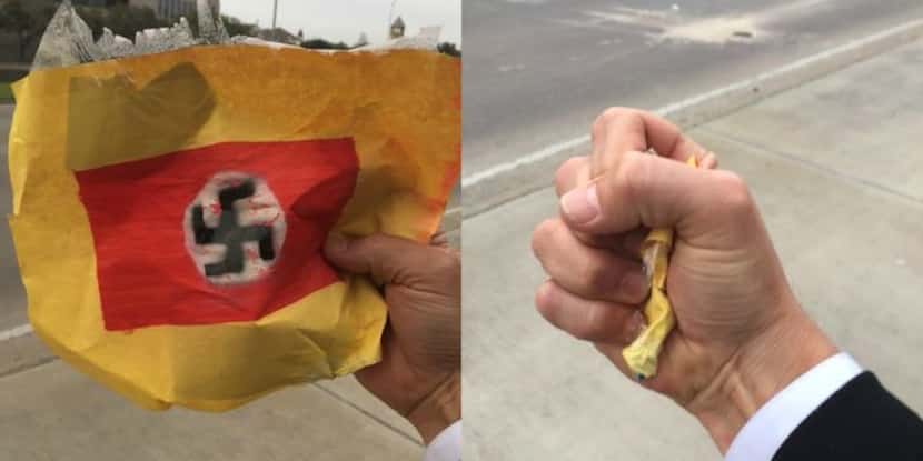 This swastika poster was found taped to a pole along Woodall Rodgers Freeway on Sunday.