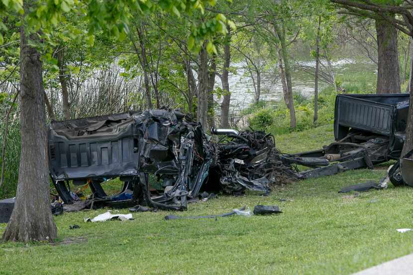 The remains of the Chevrolet Silverado that veered off Garland Road and careened across the...