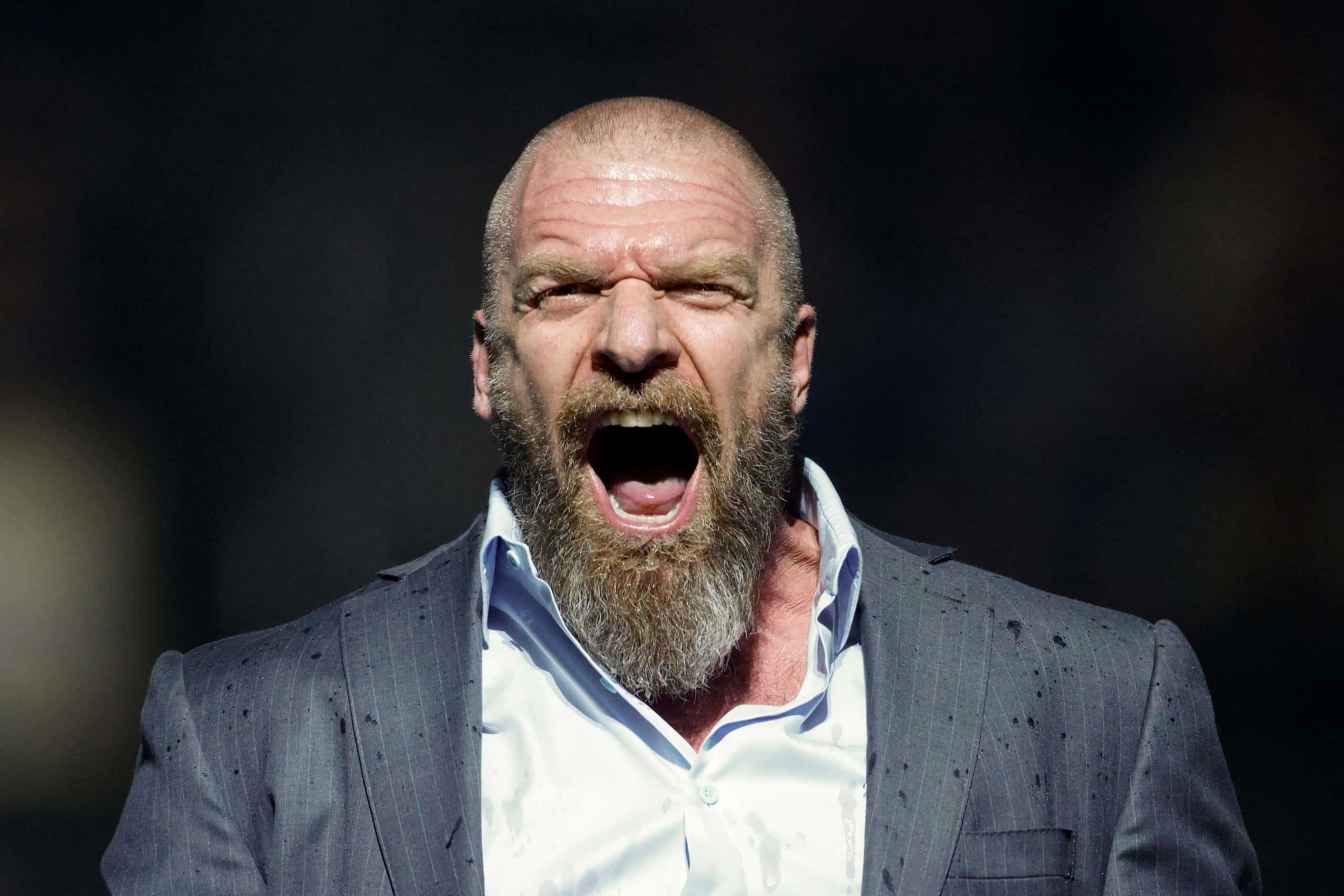 Triple H screams during WrestleMania Sunday at AT&T Stadium in Arlington, Texas, Sunday,...