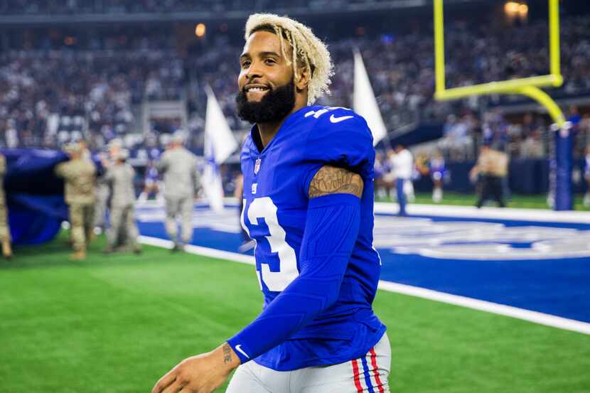 New York Giants wide receiver Odell Beckham (13) walks on the sideline before an NFL game...