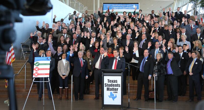 School superintendents and trustees from across North Texas raised their hands in agreement...