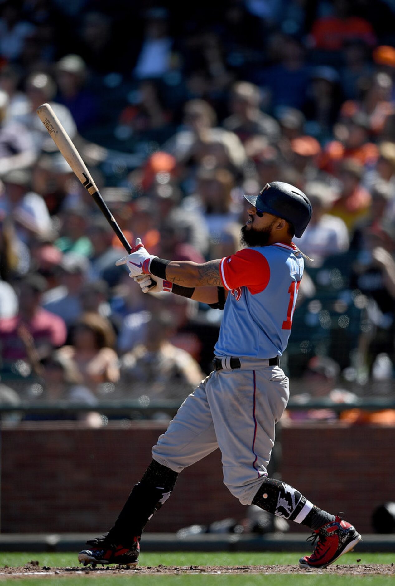 SAN FRANCISCO, CA - AUGUST 25:  Rougned Odor #12 of the Texas Rangers swings and watches the...