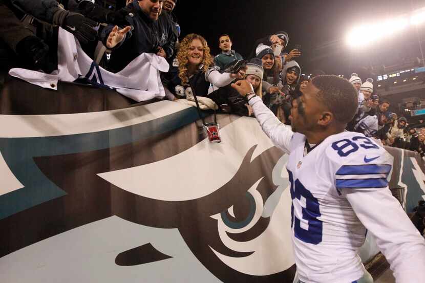 Dallas Cowboys wide receiver Terrance Williams (83) greets fans after they defeated the...