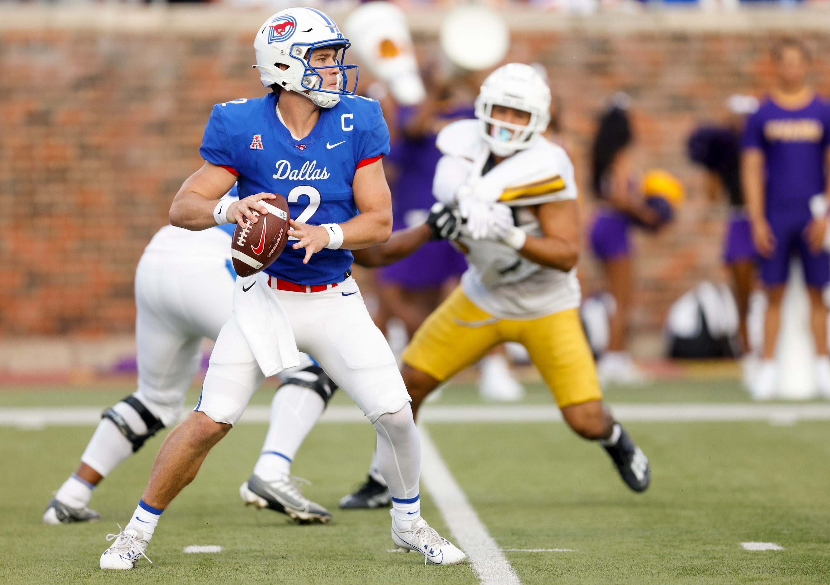 SMU quarterback Preston Stone (2) looks to pass the ball during the first half of an NCAA...