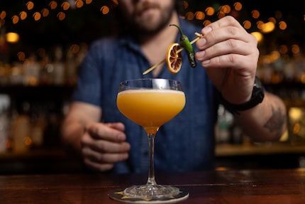 Cameron Westmoreland prepares the Santa Muerte cocktail, which will be on the menu at...