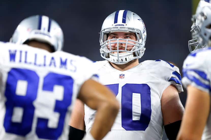 FILE - Cowboys guard Zack Martin (70) waits for play to resume during a second quarter...