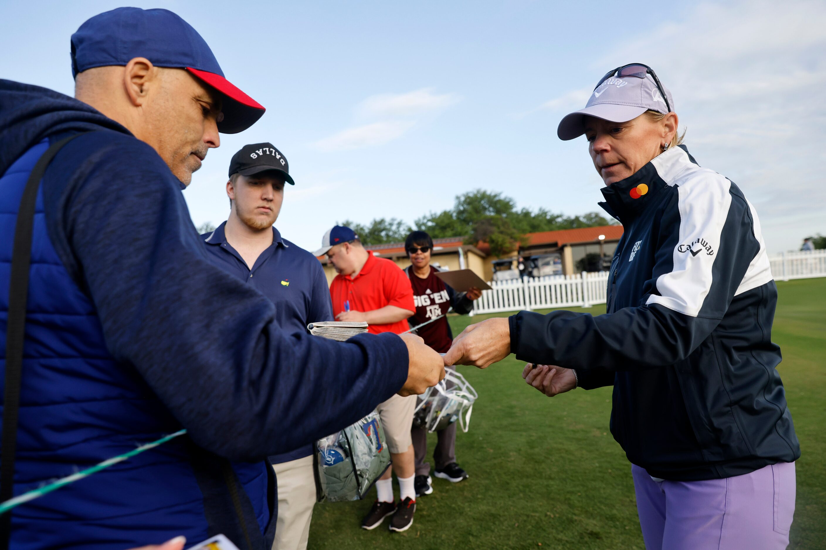 Retired LPGA golfer Annika Sorenstam signs autographs for fans before her opening round of...