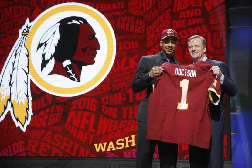 TCU’s Josh Doctson poses for photos with NFL commissioner Roger Goodell after being selected...