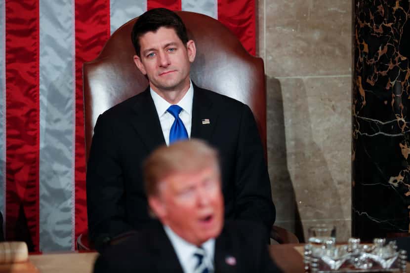 FILE -- House Speaker Paul Ryan (R-Wis.) looks on as President Donald Trump addresses a...